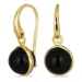 runda svart onyx örhängen i förgylld mässing - Loom Stones