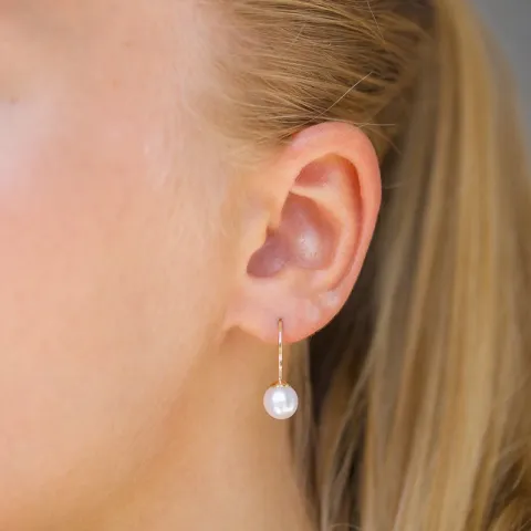 Runda 7 - 8 mm aaa-graderad sötvattenspärla örhängen i 14 karat guld med