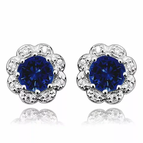 Vackra blommor blå örhängestift i rhodinerat silver