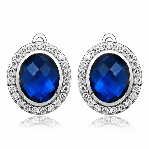 ovala blå örhängestift i rhodinerat silver