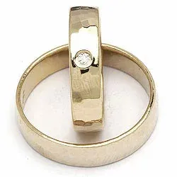 Vigselsringe från rs of scandinav i 8 karat guld 0,02 ct