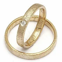Vigselsringe från rs of scandinav i 8 karat guld 0,02 ct