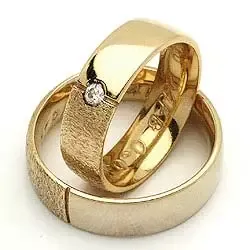 Vigselsringe från rs of scandinav i 8 karat guld 0,03 ct