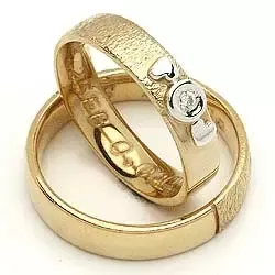 Vigselsringe från rs of scandinav i 8 karat guld- och vitguld 0,02 ct