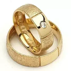 Vigselsringe från rs of scandinav i 8 karat guld 0,03 ct