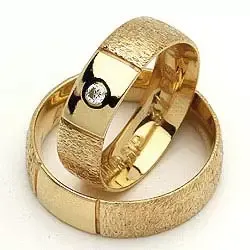 Vigselsringe från rs of scandinav i 8 karat guld 0,03 ct