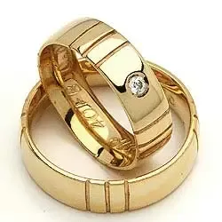 Vigselsringe från rs of scandinav i 8 karat guld 0,03 ct