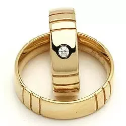 Vigselsringe från rs of scandinav i 8 karat guld 0,03 ct