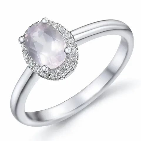 oval kvarts diamantring i 14 karat vitguld 0,80 ct 0,09 ct