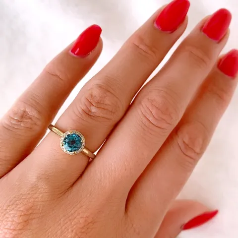 rund topas diamantring i 14  karat guld 1,08 ct 0,08 ct