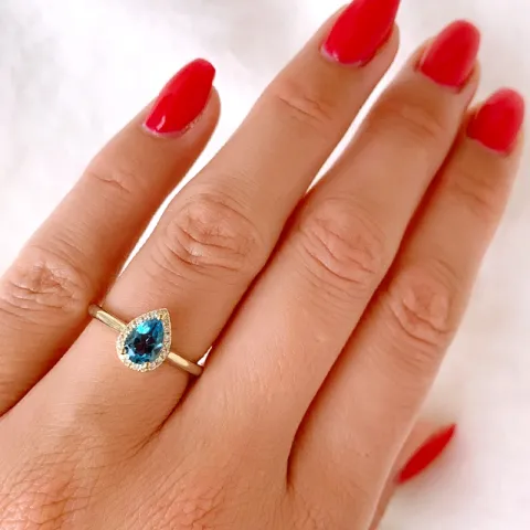 droppe topas diamantring i 14 karat guld 0,85 ct 0,09 ct