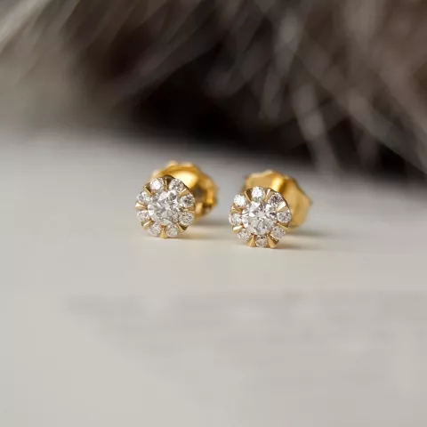 runda diamant örhängestift i 14 karat guld med diamant och diamant 