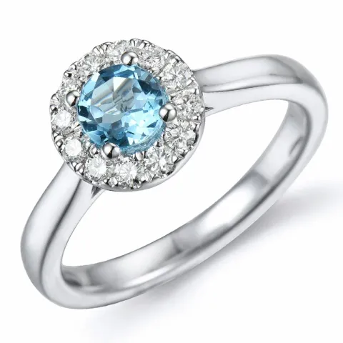 rund topas diamantring i 14 karat vitguld 0,65 ct 0,22 ct