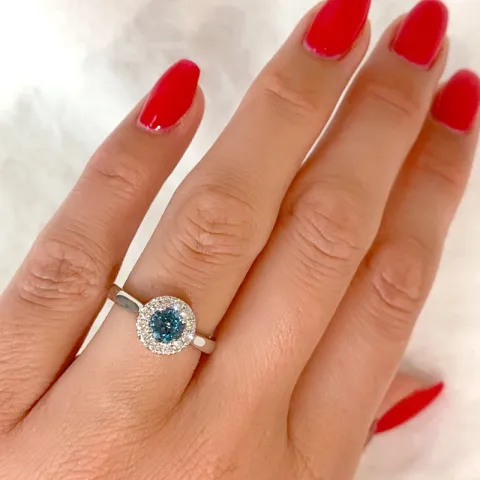 rund topas diamantring i 14 karat vitguld 0,65 ct 0,22 ct