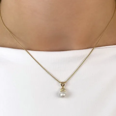 Pärla diamantberlocker i 14 carat guld 0,007 ct