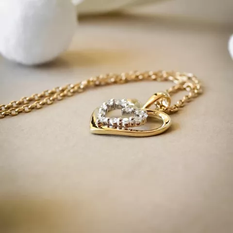 Hjärta diamant hängen i 14  carat guld- och vitguld 0,18 ct