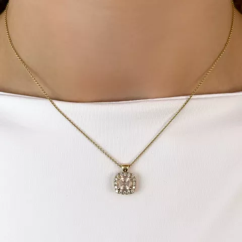 fyrkantigt kvarts diamantberlocker i 14  carat guld 1,45 ct 0,28 ct