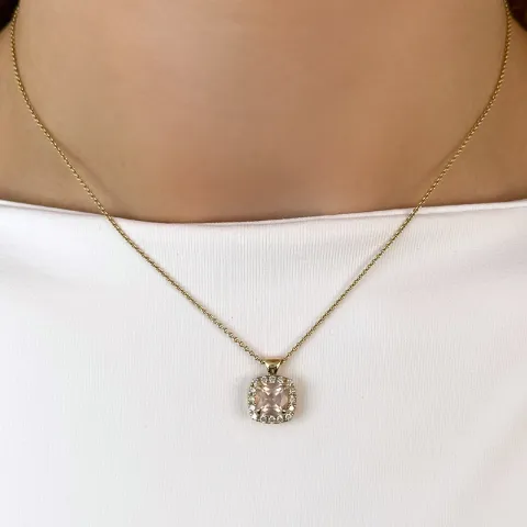 fyrkantigt kvarts diamantberlocker i 14 carat guld 1,45 ct 0,28 ct