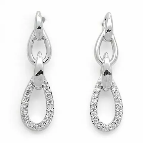 ovala diamantörhängen i 14 karat vitguld med diamant 