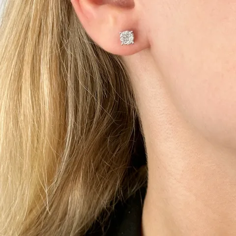 runda diamantörhängen i 14 karat vitguld med diamant och diamant