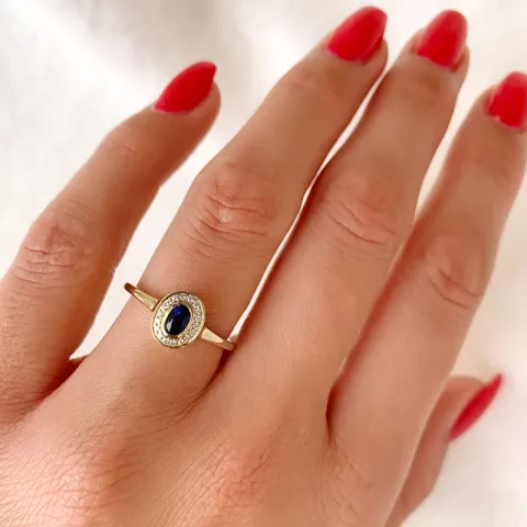 oval safir briljantring i 14 karat guld 0,35 ct 0,072 ct