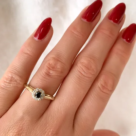 elegant svart diamant ring i 14 karat guld 0,20 ct 0,15 ct