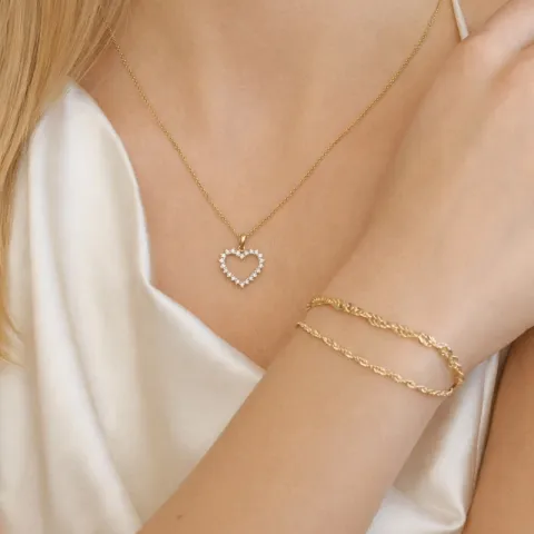 hjärta diamant hängen i 14  carat guld 0,33 ct