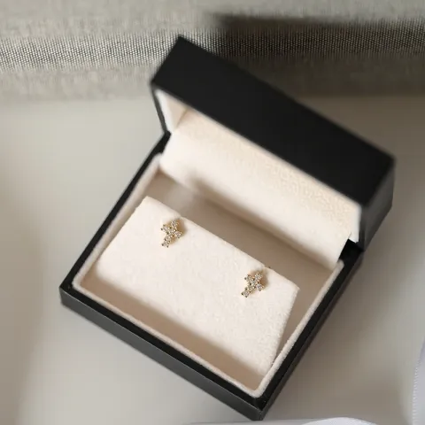 kors briljiantöronringar i 14 karat guld med diamant