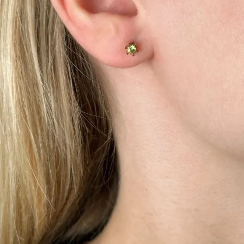 2 x 0,12 ct peridot solitäreörhängestift i 14 karat guld med peridot