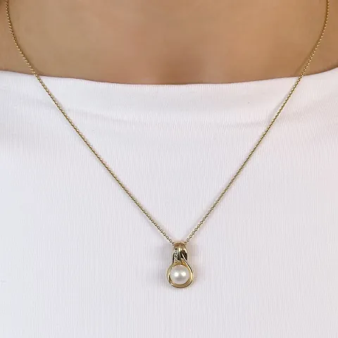 pärla diamantberlocker i 14 carat guld 0,029 ct
