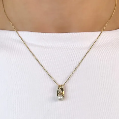 pärla diamantberlocker i 14 carat guld 0,053 ct