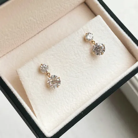 runda örhängen i 9 karat guld med