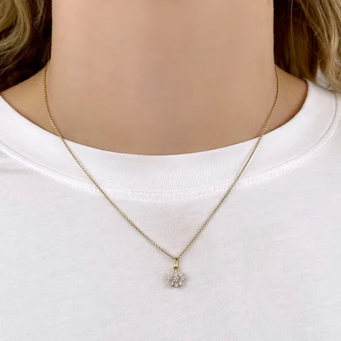 blommor hängen i 14 karat guld