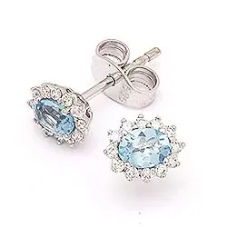 Diamant rosettörhängestift i 14 karat vitguld med diamanter och topaser 