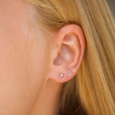 2 mm zirkon örhängestift i 9 karat guld med zirkon
