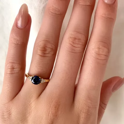 blå ring i 9 karat guld