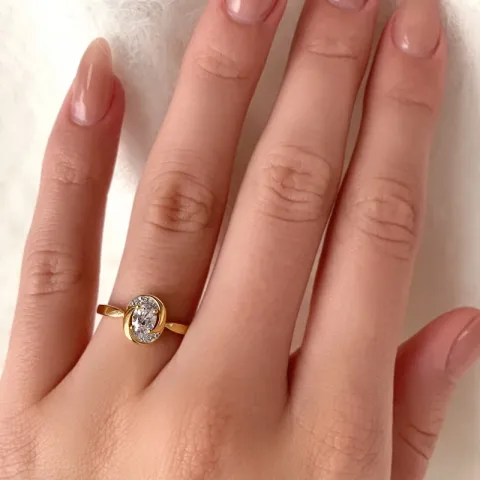 oval vit zirkon ring i 9 karat guld med rhodium