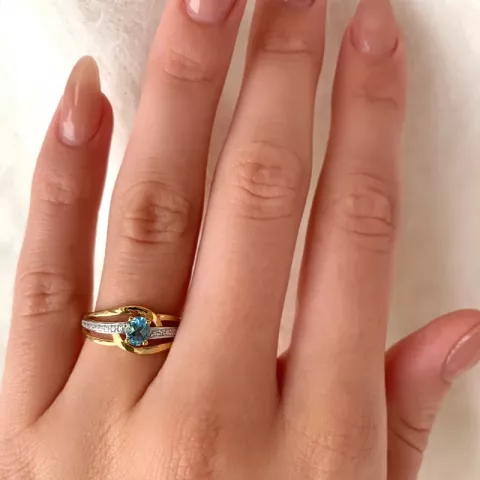 Slät blå topas ring i 9 karat guld med rhodium