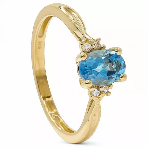 oval blå topas ring i 9 karat guld