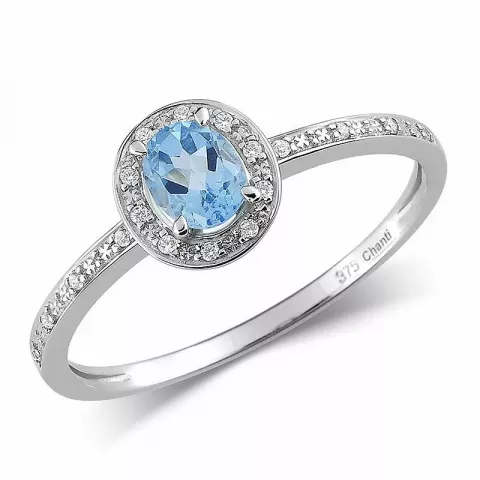 Blank oval blå topas ring i 9 karat vitguld