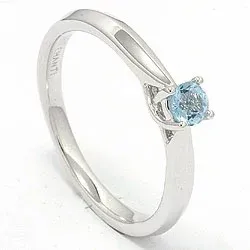 topas ring i 14 karat vitguld 0,25 ct