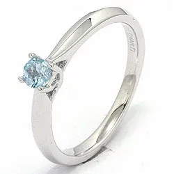 topas ring i 14 karat vitguld 0,25 ct