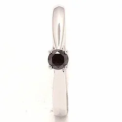 sort diamant ring i 14 karat vitguld 0,20 ct