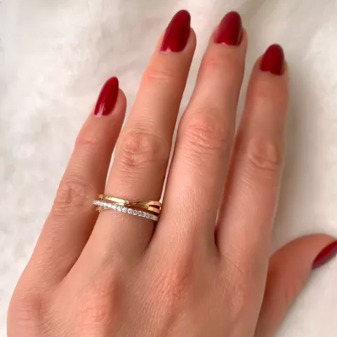 abstrakt diamant ring i 14  karat guld- och vitguld 0,16 ct