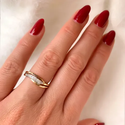 abstrakt diamant ring i 14  karat guld- och vitguld 0,09 ct
