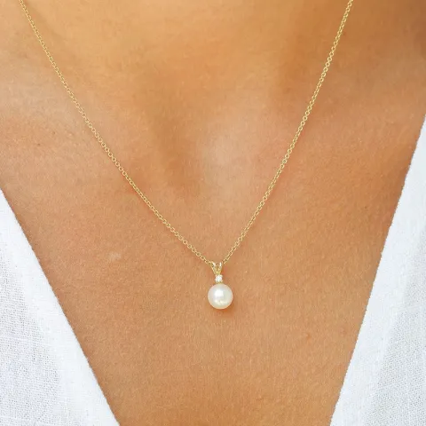 pärla diamantberlocker i 14  carat guld 0,02 ct