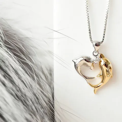 delfin diamantberlocker i 14 carat guld- och vitguld 0,04 ct