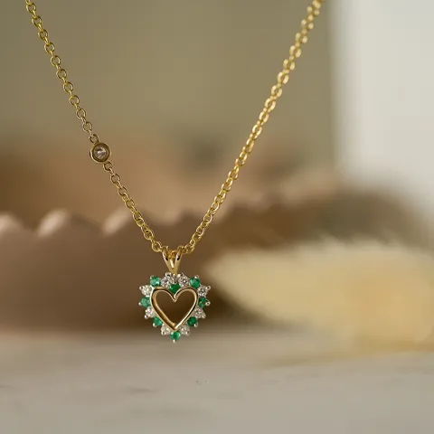 hjärta smaragd hängen i 14 carat guld- och vitguld 0,13 ct 0,14 ct