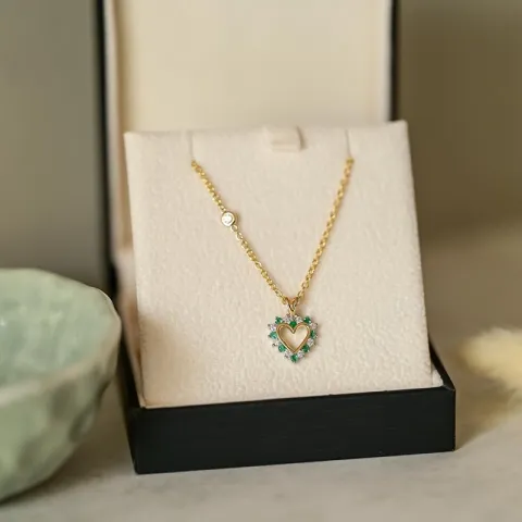 hjärta smaragd hängen i 14 carat guld- och vitguld 0,13 ct 0,14 ct
