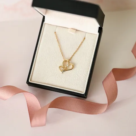 hjärta hängen i 14 carat guld 0,06 ct